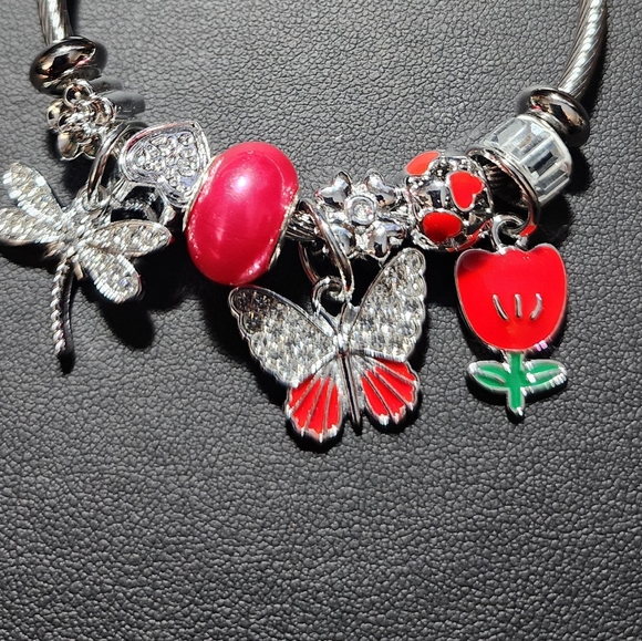 STAINLESS STEEL TWIST CHARM BRACELET - Picture 7 of 7